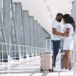african-couple-hugging-tight-long-separation-airport-welcoming-embrace-standing-free-space-157663102