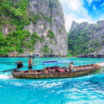 KRABI – DECEMBER 1: Long boat and tourist at Maya bay in Phi Phi