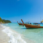 Long tail boat on tropical beach, Krabi, Thailand